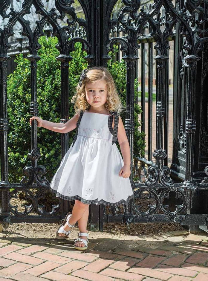 Little girl in poodle dress